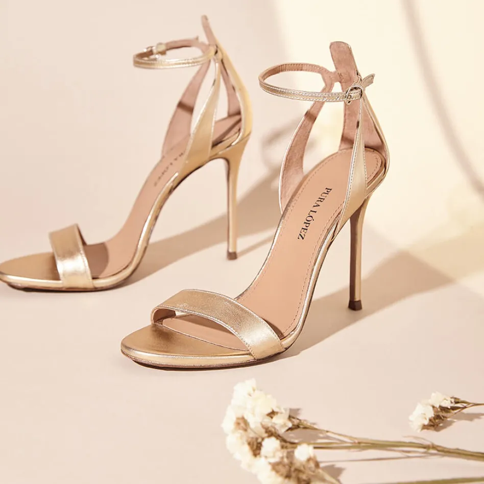 Martina Ankle-strap high heeled sandals in gold metallic leather