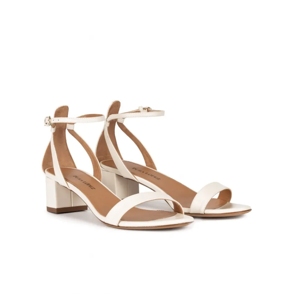 Oneida Ankle strap mid block heel sandals in offwhite leather