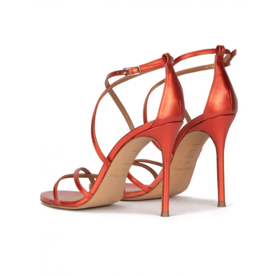 Oria Crossed-strap high heel sandals in coral metallic leather