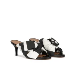 Orquidea Bow detailed mid heel mules in black and white fabric