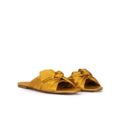 Quetty Bow detailed flat sandals in mustard satin
