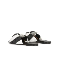 Quetty Bow-detailed flat sandals in black and white fabric