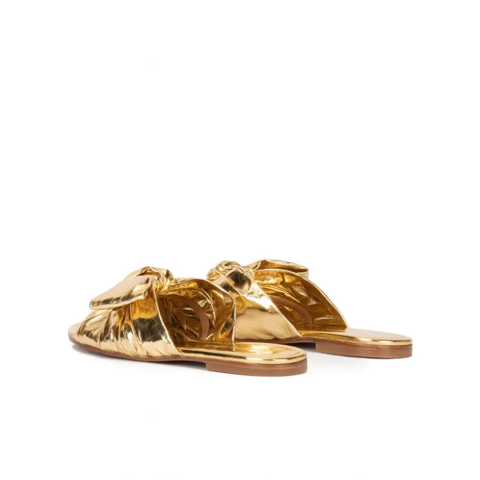 Quetty Gold flat sandals with bow detail