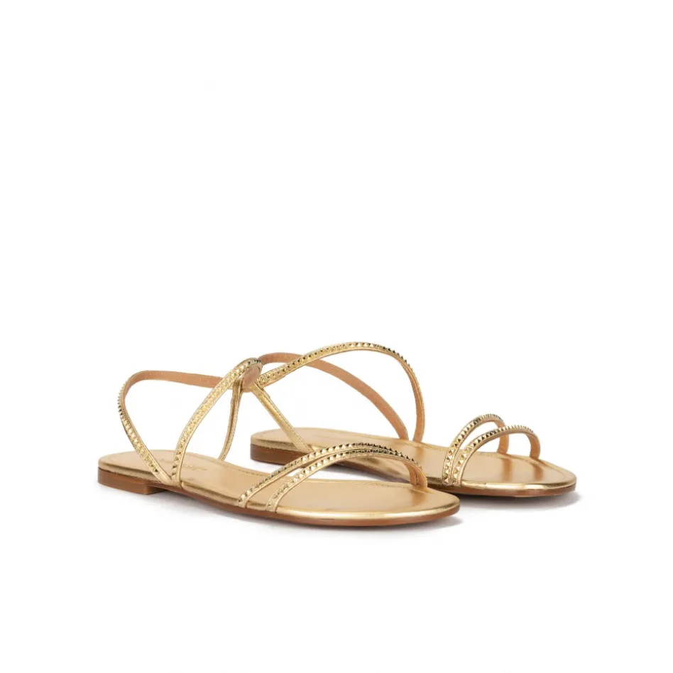 Quimora Golden strappy flat sandals in leather with pyramid studs