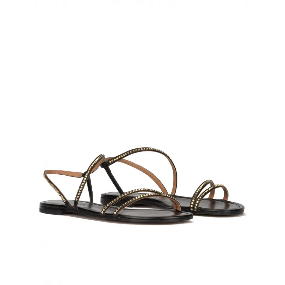 Quimora Strappy flat sandals in black leather with golden studs