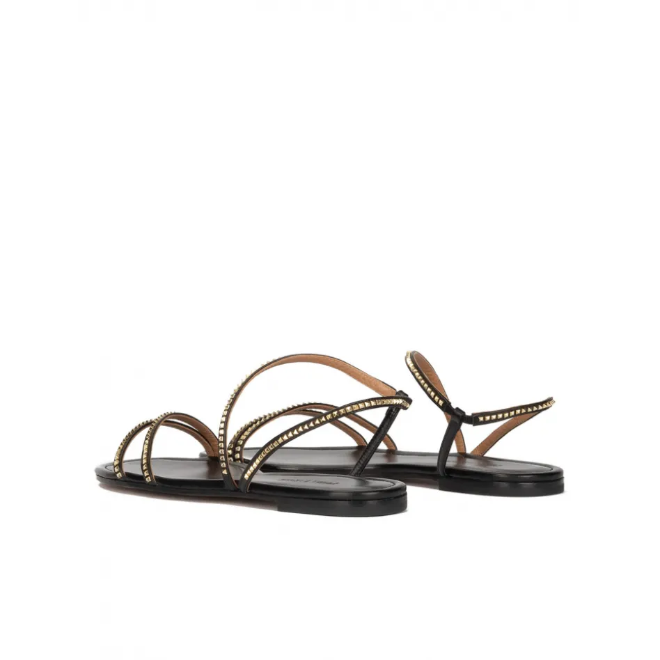 Quimora Strappy flat sandals in black leather with golden studs