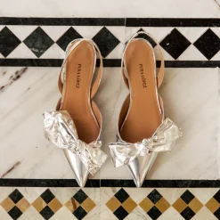 Quinette Bow detailed pointy toe flats in silver mirrored leather