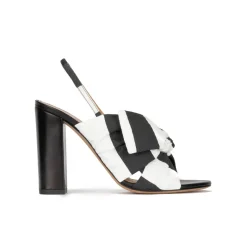 Quirina Bow detailed high block heel sandals in black and white