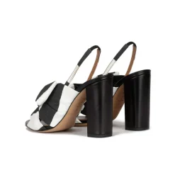Quirina Bow detailed high block heel sandals in black and white