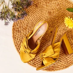Quirina Bow-detailed high block heel sandals in mustard satin